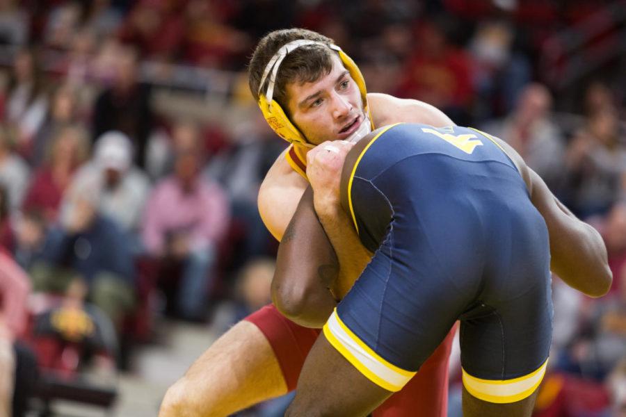 Iowa State Redshirt sophomore Chase Straw Wrestles Zachary Moore during the Iowa State vs West Virginia wrestling meet Jan. 21. The Cyclones Defeated West Virginia 25-16.