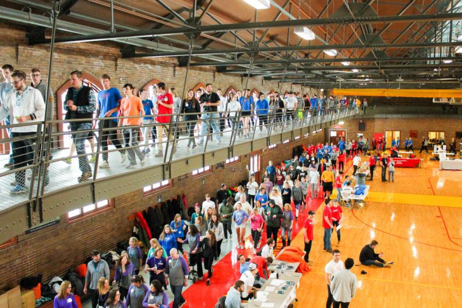 Students and other participants walk at the American Foundation for Suicide Prevention Out of Darkness walk on March 24. at State Gym.