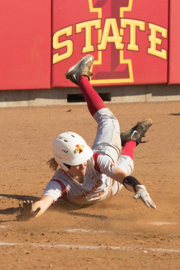 Sophomore Sami Williams Slides into home after junior Sydney Stites hits a triple Sep. 23. The Cyclones defeated the Kirkwood Eagles 9-1.