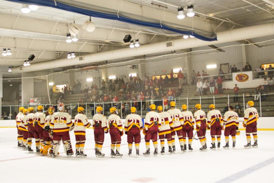 Members of the Cyclone Hockey club team line up on center ice after the final period of their first official game of the season Sept. 22. The Cyclones defeated Illinois State 4-1. 