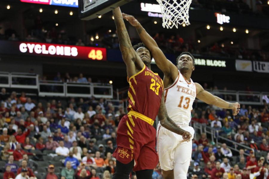 Iowa State junior Zoran Talley dunks the ball on a fast break opportunity during the second half against Texas in the Big 12 Championship.