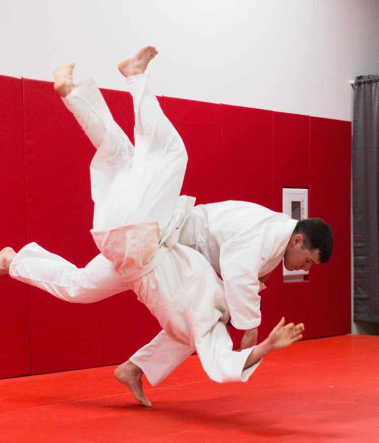 After kicking out the legs of senior in aerospace engineerig Jaroslaw Jozwik, Cameron Baxter slams his upper body to the floor, sending the future engineers legs to the sky. Days ahead of a conference, the team trains tirelessly in preparation. The Iowa State Judo Club will be competing in the 2018 National Collegiate Judo Association Championships Sunday, Mar. 11 in Lied Recreation Athletic Center.