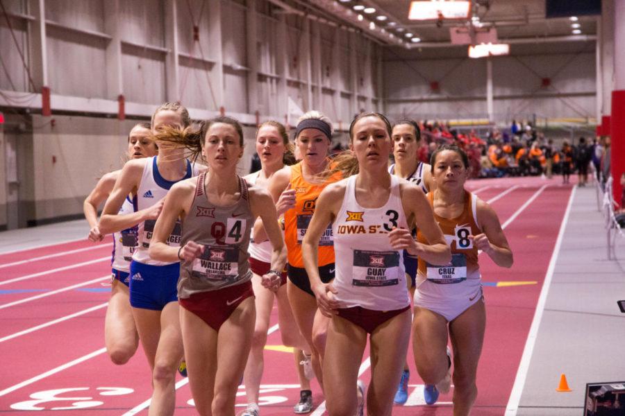 Senior Evelyne Guay runs in the Women's Mile Finals during the Big 12 Track and Field Championship at Lied Rec Center on Feb. 24. Guy finished in fourth place with a time of 4:56.71.