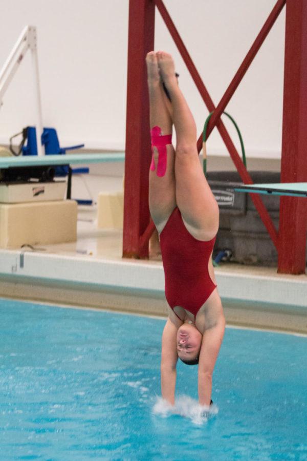 Dana Liva races in the 3-meter springboard during the Cardinal and Gold meet at the Beyer pool Oct 13. 