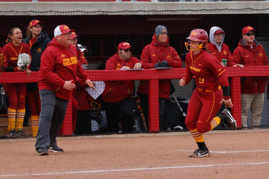Iowa+States+Kaylee+Bosworth+gets+waved+home+by+coach+Jamie+Pinkerton+during+the+Cyclones+11-4+loss+to+Texas+March+30%2C+2018%2C+at+the+Cyclone+Sports+Complex.