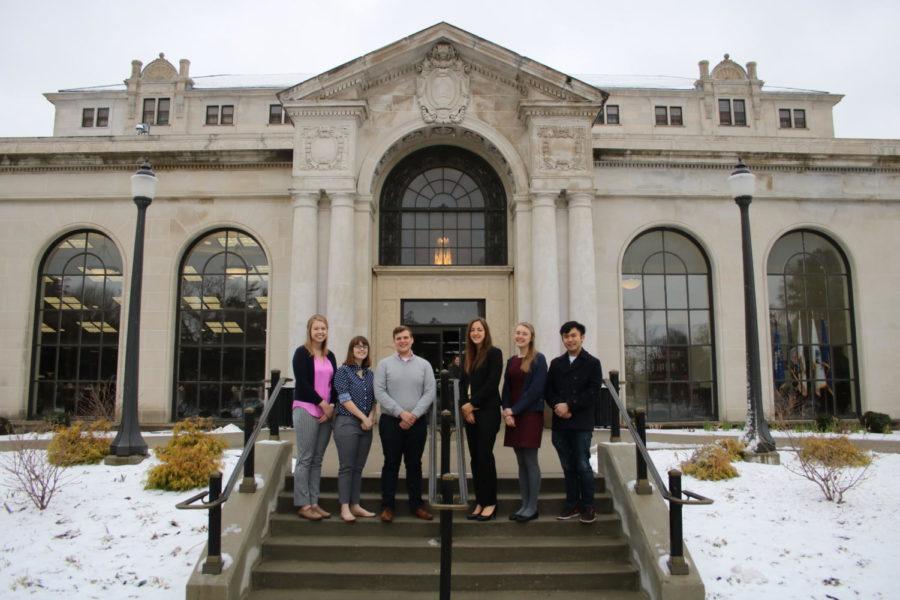 Six of 23 finalist and winners of Nationally Competitive Scholarships pose outside of the Memorial Union.