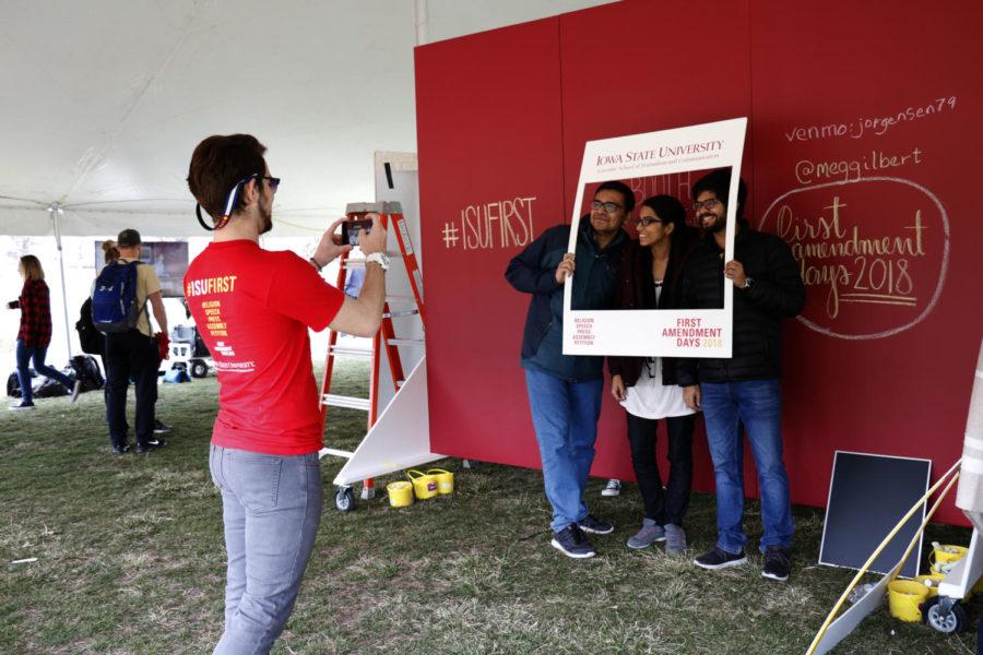 Students gather on central campus for #Mosaic, which shows the five freedoms of the First Amendment, on April 12. The even included a photo booth with props and people were able to post the pictures online with the #isufirst.