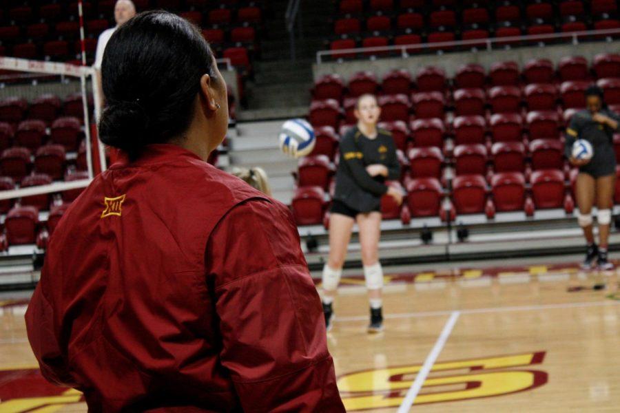 Iowa State assistant volleyball coach Fiona Fonoti warms-up with sophomore setter Piper Mauck prior to the Iowa State spring tournament on Saturday April 7, 2018.