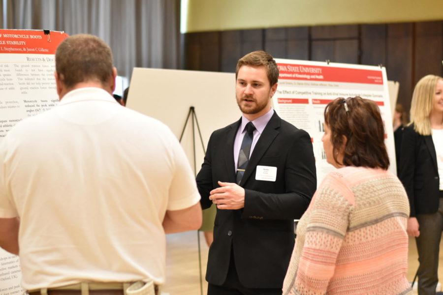 Justin Wilder presents his groups study on the effectiveness of motorcycle boots to prevent ankle injuries at the Honors poster presentations on April 25, 2018.
