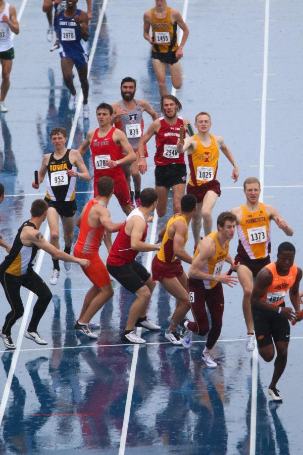 Iowa State redshirt sophomore Dan Curts hands off the baton to Jaymes Dennison during the mens distance medley relay at the Drake Relays in Des Moines April 29. The Cyclones finished ninth in 10:02.25.
