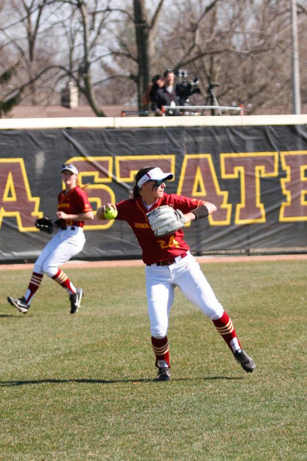 Iowa State left fielder Kaila Konz tosses a ball back to the infield during the Cyclones 4-2 win over Iowa in the Cy-Hawk Series.