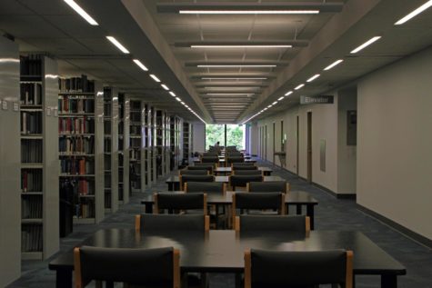 One student studies at the end of a long row of tables on the third floor of Parks Library. Although it’s the first week of summer classes, campus is looking fairly empty as many have gone home and more and more students take their summer classes online.