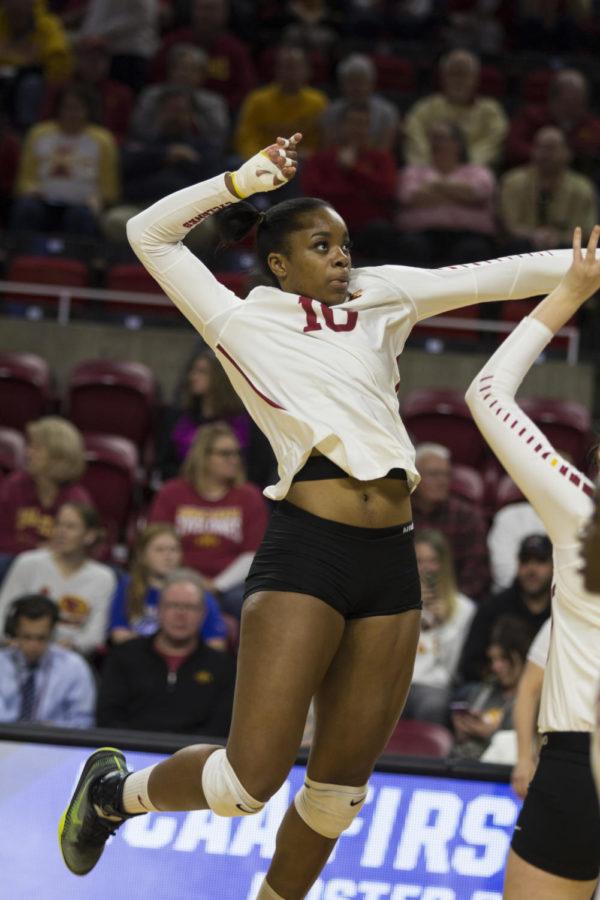 Junior Middle Blocker Grace Lazard goes up for a spike during the first round of the NCAA Volleyball Championship against Princeton University at Hilton Coliseum in Ames, Iowa Dec. 01. The Cyclones defeated the Tigers in three consecutive sets.