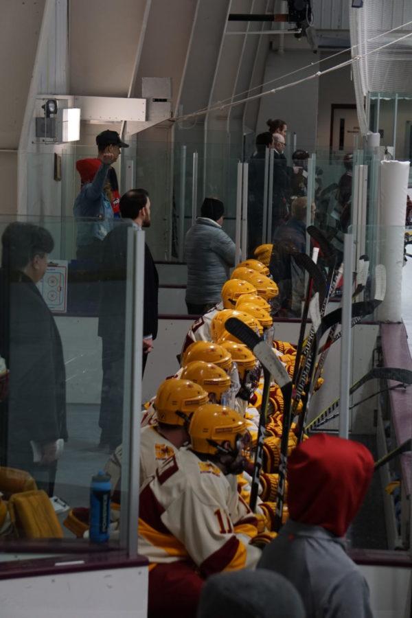 At the Iowa State VS Rob Morris hockey game on January 19th, benched players watch their team mates hold their 1-0 lead.
