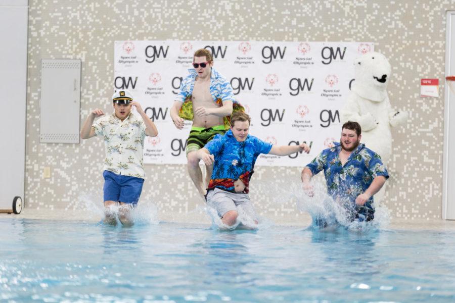 Members of the Iowa State Greek Community Jump into the pool at State Gym for Polar Plunge April 6.