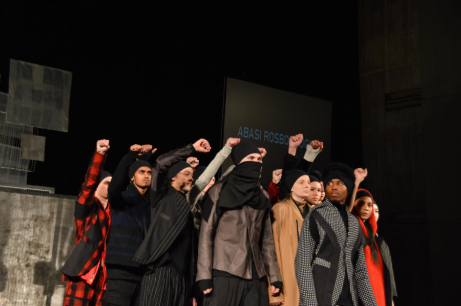 Models wearing looks from the Abasi Rosborough Autumn/Winter 2017 collection “Dissident” raise their fists at The Fashion Show event held at Stephens Auditorium on April 8. Abdul Abasi and Greg Rosborough were the guest designers this year. The collection was inspired by a photo of a woman, Ieshia Evans, as she was being arrested by police officers during a Black Lives Matter protest in Baton Rouge, La.