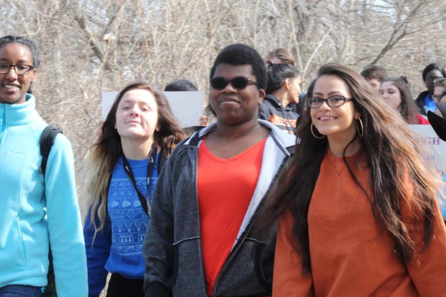 Ames high senior talks about the future she hopes for her children and the next generation at the Ames High Walkout Friday. 