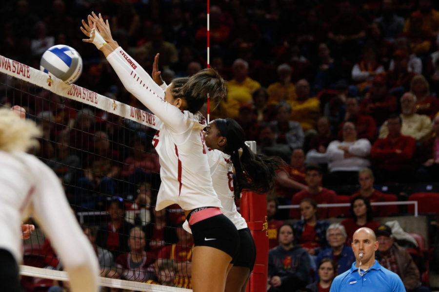 Grace Lazard and Monique Harris attempt to block the ball during Iowa States second round loss to Wisconsin in the NCAA Tournament. 