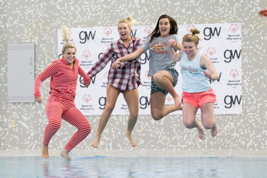Members of the Iowa State Greek Community Jump into the pool at State Gym for Polar Plunge April 6.