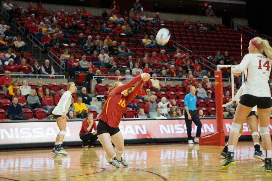 At+the+Iowa+State+womens+volleyball+game+on+October+30th%2C+player+Hali+Hiliegas+saved+an+attempted+point+against+Iowa+State+by+sliding+into+a+save.