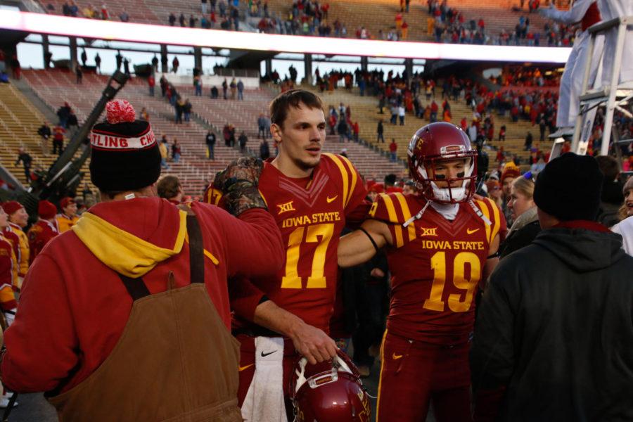 Kyle Kempt and Trever Ryen walk off the field following Iowa State 14-7 win over No. 4 TCU. 