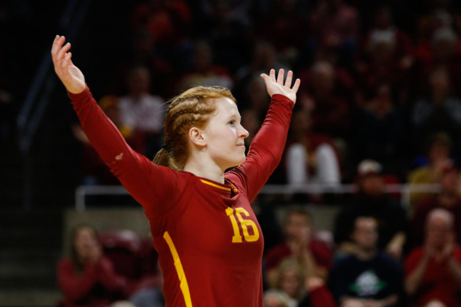 Then redshirt sophomore libero Hali Hillegas celebrates after Iowa State got a point against Wisconsin during the second round of the NCAA Tournament. Hillegas and the Cyclones would drop their match 3-0 (25-22, 25,20, 25-23) to the Badgers. 