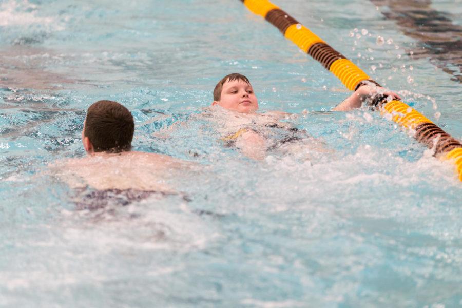 Iowa Special Olympic Athletes warm up before the start of the swimming portion of the summer games in Beyer Hall May 18.