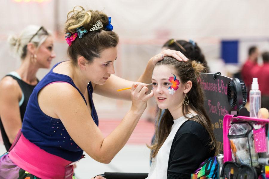 Odyssey of the Mind participant gets her face painted during the Creativity Festival in Leid Recreation Festival May 24.