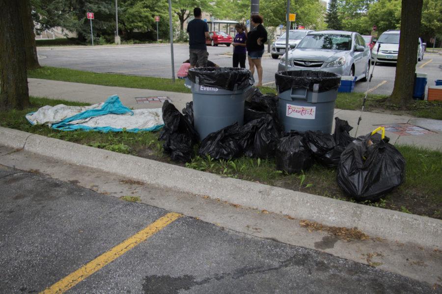 Volunteers gather at College Creek to help the Live Green! initiative and Keep Iowa State Beautiful with taking out the garbage that is in and around the creek. "We had over 50 volunteers sign up and pretty much everyone showed up and even more joined later," said Paige Myers. Myers recently graduated from Iowa State and is sticking around during the summer to help with projects such as the creek cleanup.