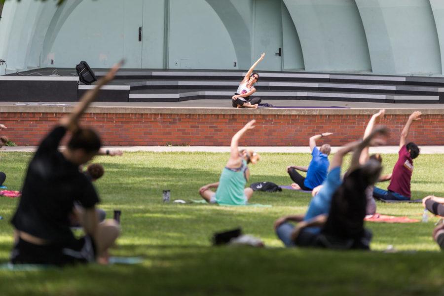 Members+of+the+Ames+community+participate+in+a+Yoga+session+lead+in+Ames+Bandshell+Park+June+16.