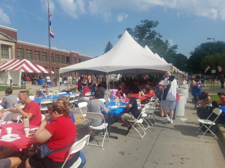 Hundreds gather to eat pancakes at the 13th annual Fourth of July pancake breakfast in Ames. 