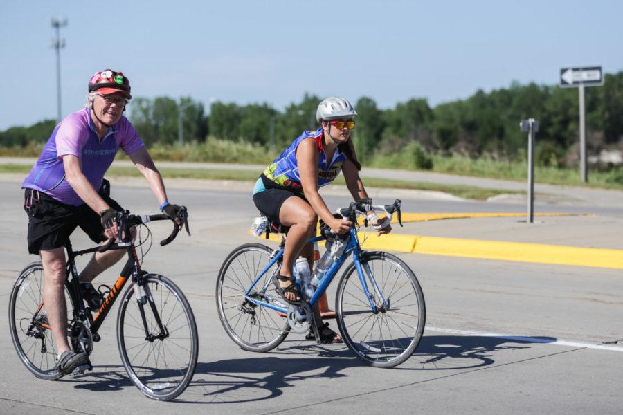 RAGBRAI Bikers arrive in Ames July 24 at the corner or Mortensen Road and South Dakota Ave. the first biker arrived alone around 8:15 but was followed by a steady stream of bikers thought out the rest of the day.