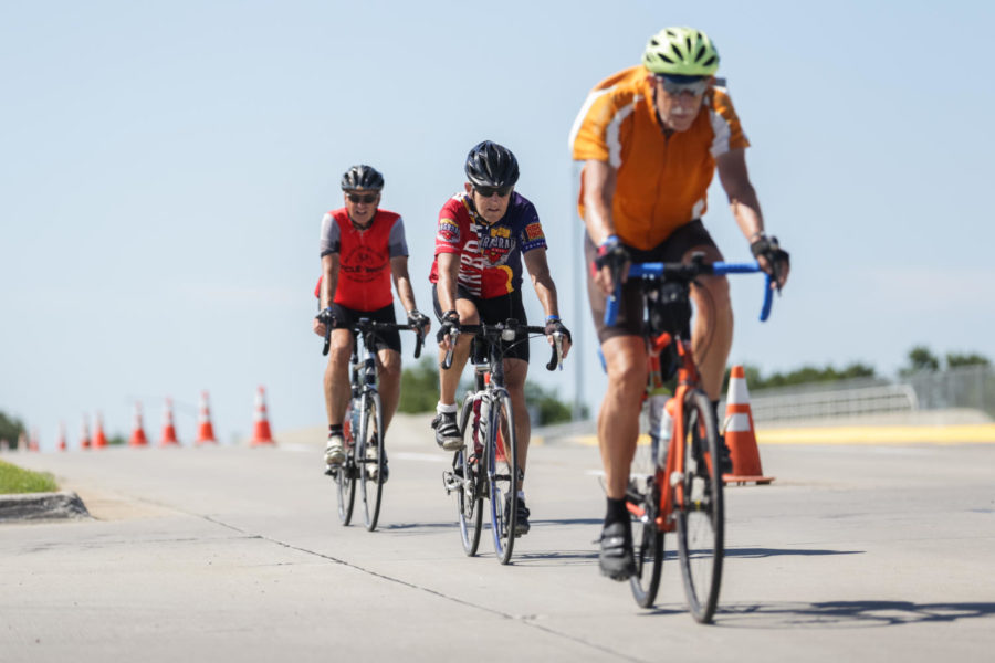 RAGBRAI Bikers arrive in Ames July 24, 2018, at the corner or Mortensen Road and South Dakota Ave. the first biker arrived alone around 8:15 but was followed by a steady stream of bikers thought out the rest of the day.