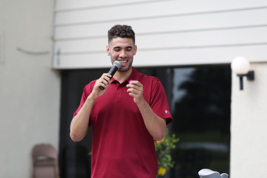 George Niang reads off raffle winners at the annual Georges Niang Golf Outing July 30.