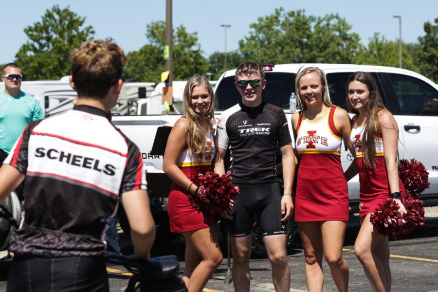 Members of the ISU Dance team lead stop for a photo during RAGBRAI pep rally outside of Jack Trice Stadium