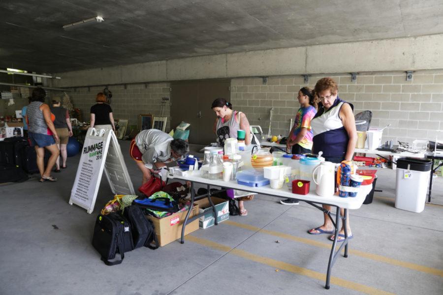 Furniture and knickknacks fill the Ames Intermodal Facility as part of the Ames Rummage Sale July 30.