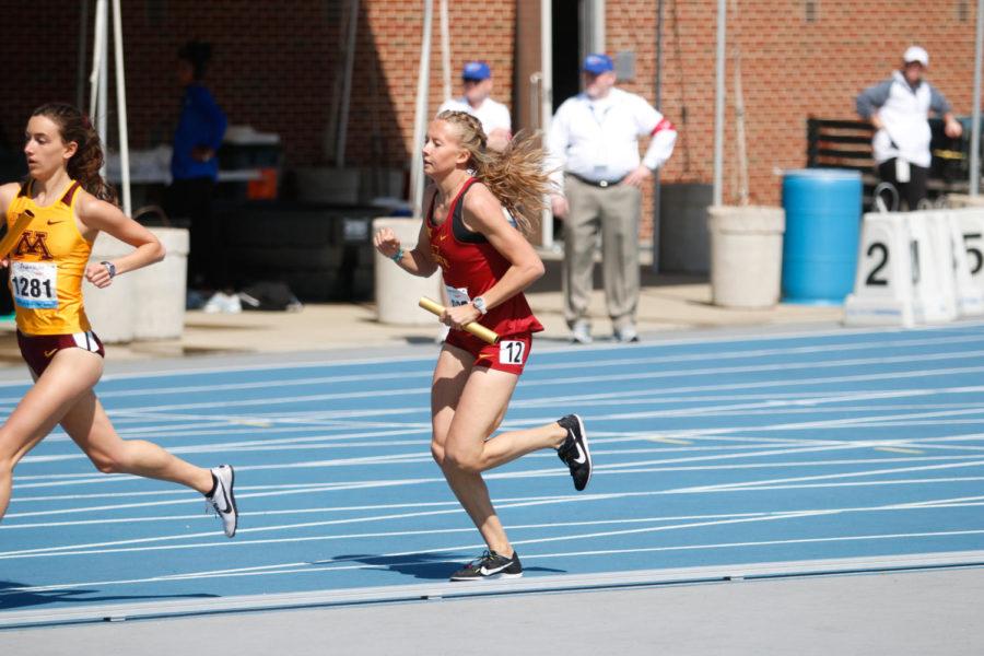 Iowa State freshman Cailie Logue runs the third leg of the 4x1600 at the Drake Relays. Logue and the Cyclones finished in second place with a time of 19:26.25.