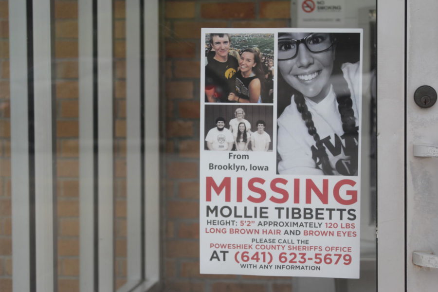 Mollie Tibbetts poster hung outside of an ATM kiosk on Lincoln Way on Aug. 19.