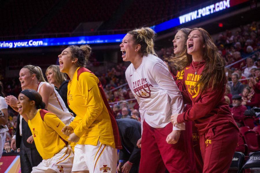 Members+of+the+Iowa+State+Womens+Basketball+Team+cheer+on+their+teammates+from+the+side+of+the+court+during+their+game+against+the+Texas+Longhorns+on+Feb.+24+at+the+Hilton+Coliseum.