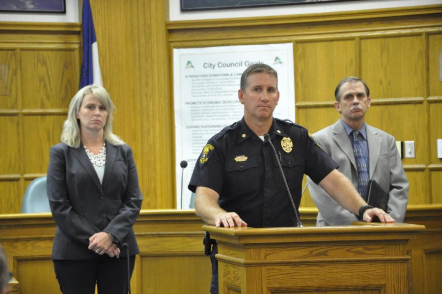 Story County Attorney Jessica Reynolds, left, Cmdr. Geoff Huff, center, and Chief Charles Cychosz present for Huff to speak at a press conference on Monday in Ames City Council chambers.