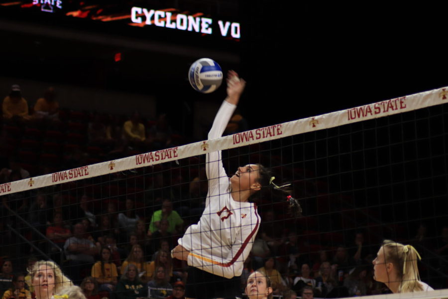 Sophomore Candelaria Herrera spikes the ball during the Iowa State vs. Baylor volleyball game in the Hilton Coliseum on Sept. 22. The Cyclones lost 2-3. 