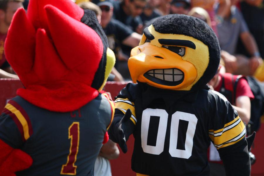 Cy and Herky play a friendly round of rock, paper, scissors during during the annual CyHawk football game Sept. 9, 2017. The Cyclones fell to the Hawkeyes 44-41 in one overtime.