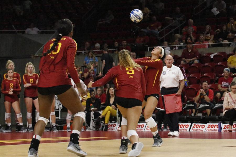 Izzy Enna, defensive specialist/libero, bumps the ball during the Sept. 16 game in Hilton Coliseum.