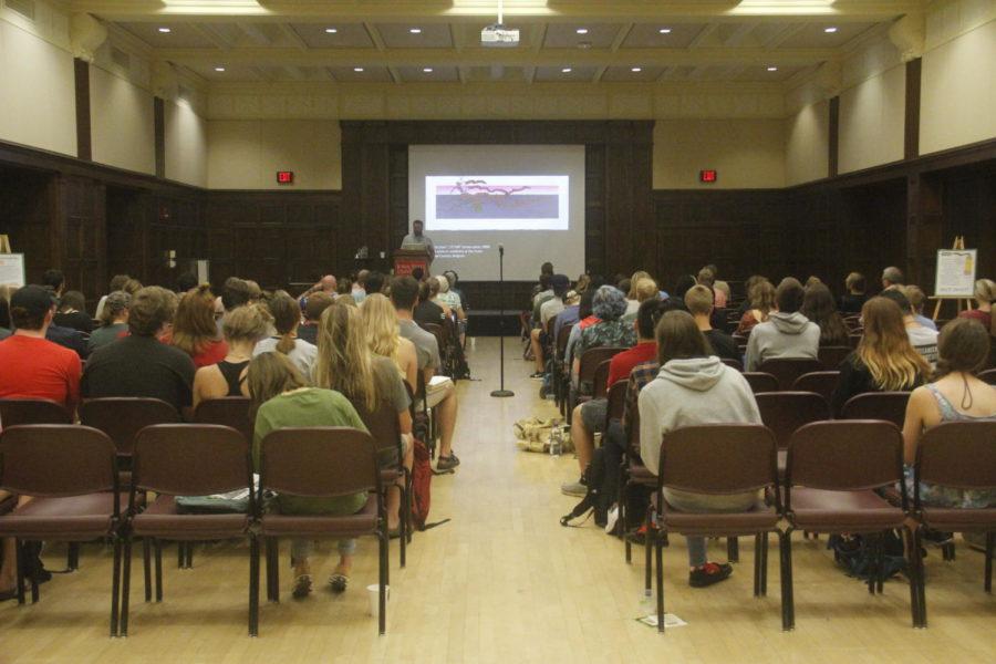 Students listen to Andrew Kozlowski, an art and print maker, speak about his work during his lecture at the Memorial Union on Sept. 20. Kozlowski will hold a workshop on Friday, September 21, where the participants will learn how to make their own prints.