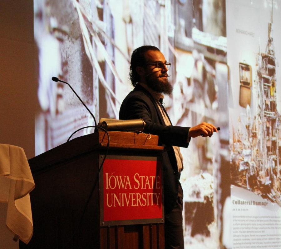 Mohamad Hafez, architecture graduate from Iowa State University, speaks about how he uses his art to recreate a time or memory through a suitcase. Through his art he hopes to humanize the refugees plight. This lecture took place in the Memorial Union on Sept. 5.