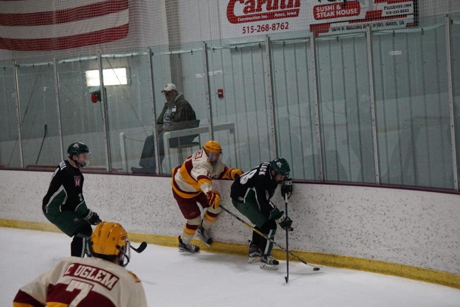 Junior Aaron Azevedo races for the puck during the Iowa State vs Ohio University hockey game on February 17th. The Cyclones lost to the Bobcats 6-1.