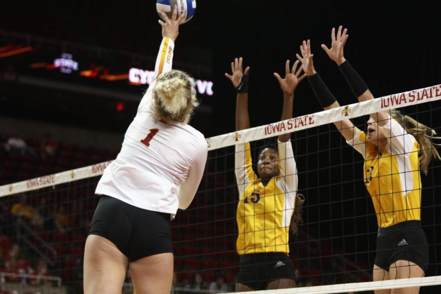 Iowa State senior Hannah Bailey attempts to spike the ball against Wyoming on Sept. 13. Iowa State swept Wyoming, 3-0.