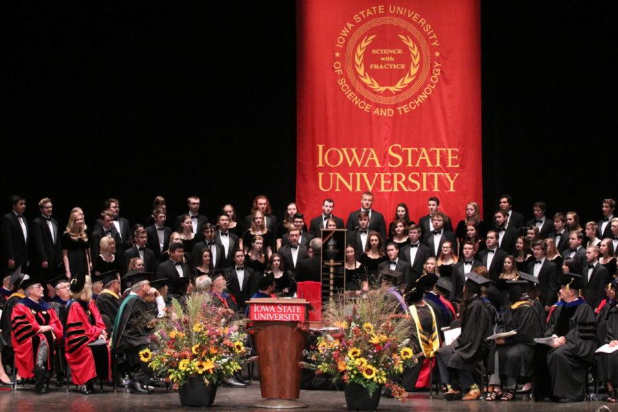 Attendees from Wendy Wintersteen’s presidential installation ceremony at Stephens Auditorium on Sept. 21 turn to watch the Iowa State Singers perform If Music Be the Food of Love and The Bells of Iowa State during the closing of the ceremony.