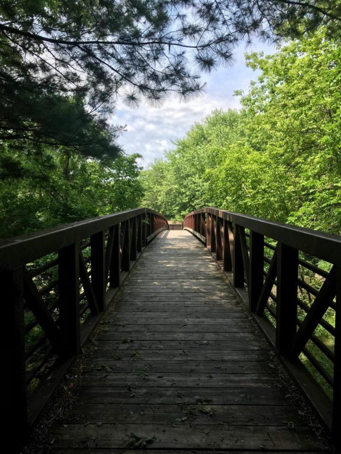 A bridge over the Skunk River provides outdoor enthusiasts an entrance to hiking trails at River Valley Park. 