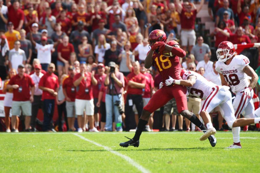 Wide receiver, Hakeem Butler, runs towards the end zone during the second quarter of the football game against Oklahoma State. Butler scored the first touchdown for the Cyclone team during the game at Jack Trice Stadium on Sept. 15.